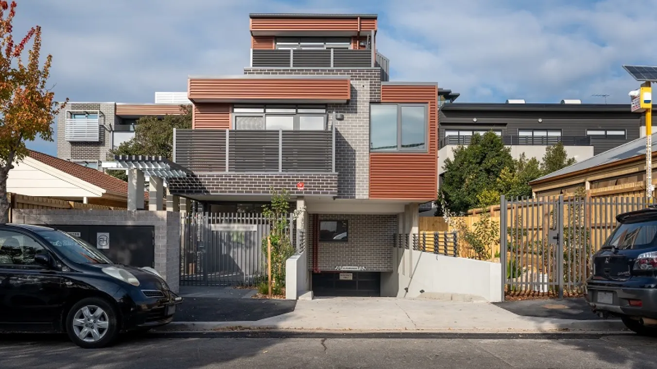 Image of newly built house with big windows allowing ample of sunlight to enter house,balcony and underground car space