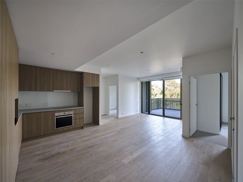 Image of indoor area with modern kitchen, meal and family area 