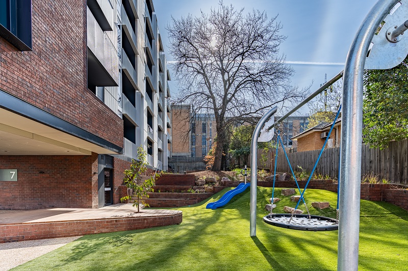 Image of Shared play space with surrounded by greenery