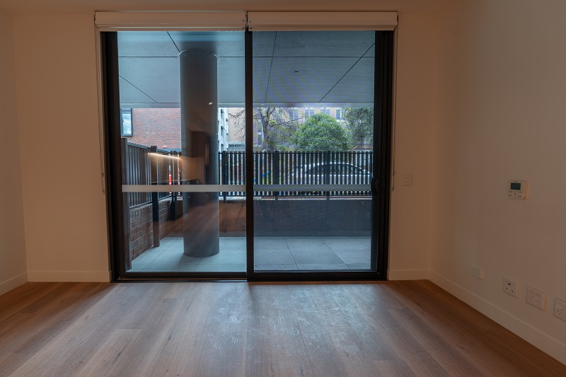 Image of Inside a new home with air cone fitted and balcony attached to the living room