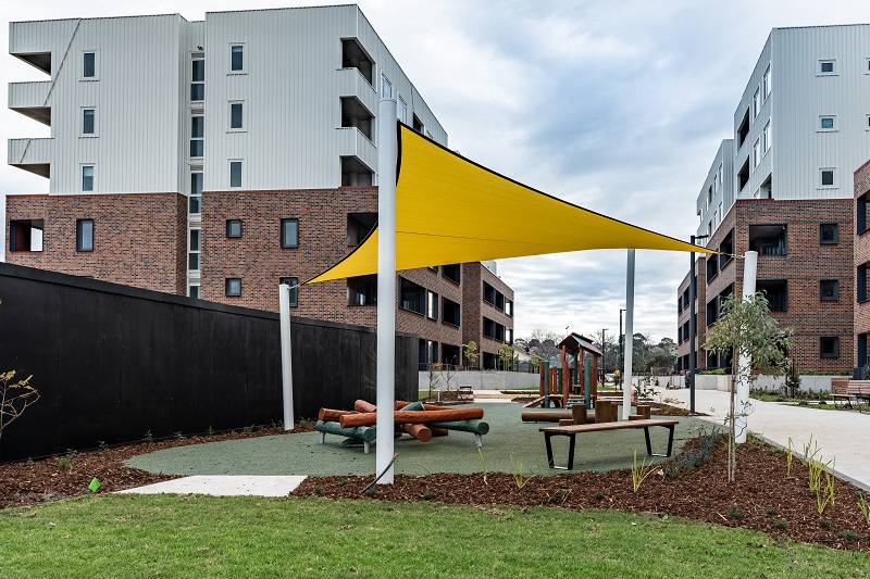 Image of Children's play space in Harvest Square, Brunswick West with lots of playing equipments in the area