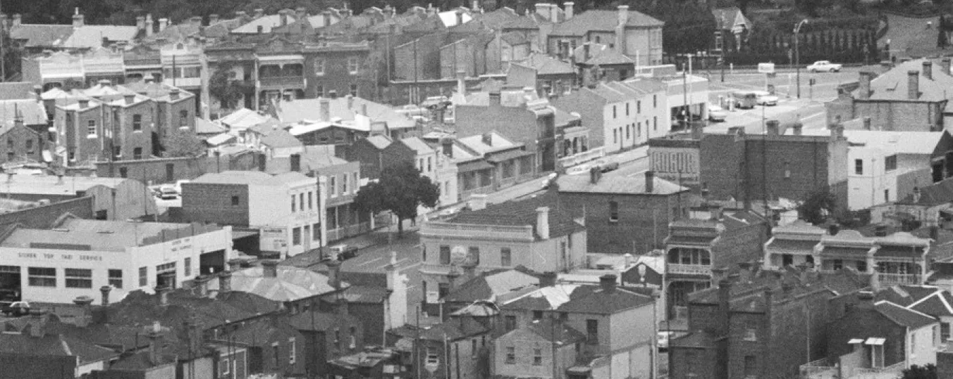 Black and white image of large-scale public housing projects across Melbourne