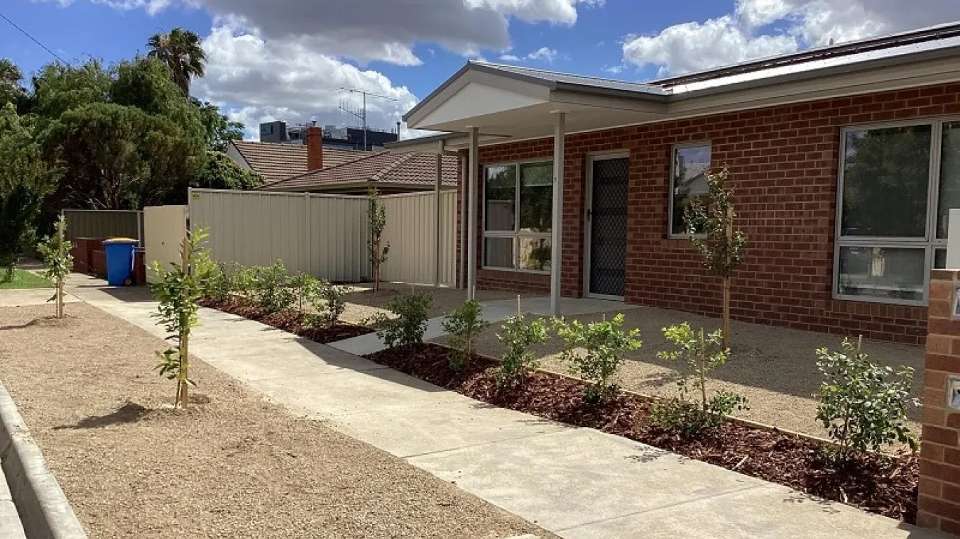 Image of the new homes with beautiful plantation